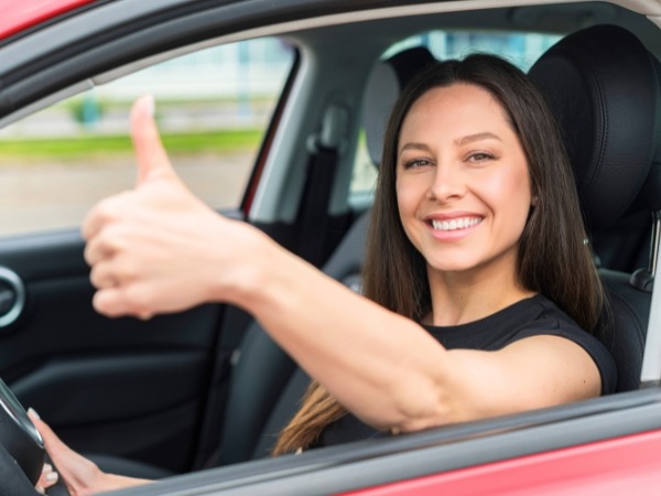 Woman Driving a Car