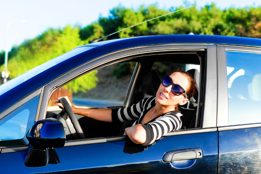 Woman Driving a Car